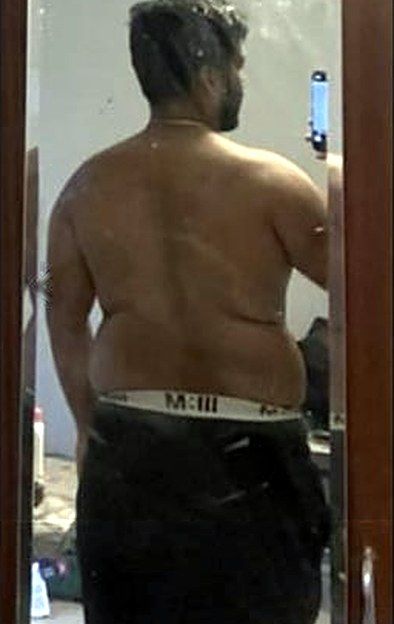 Client from behind before coaching, 106.4 kg